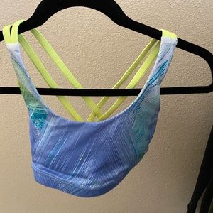 Lululemon energy bra. Light Blue pattern with neon yellow straps. Size 4